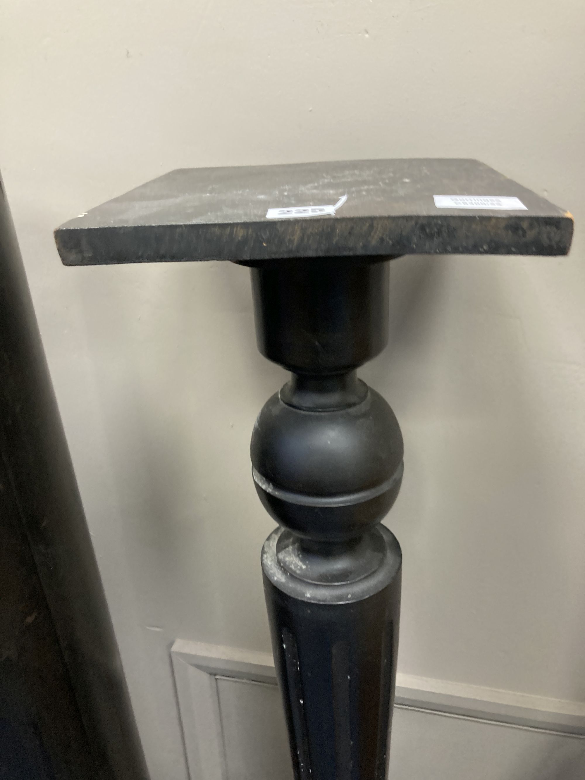 An ebonised pedestal, height 96cm